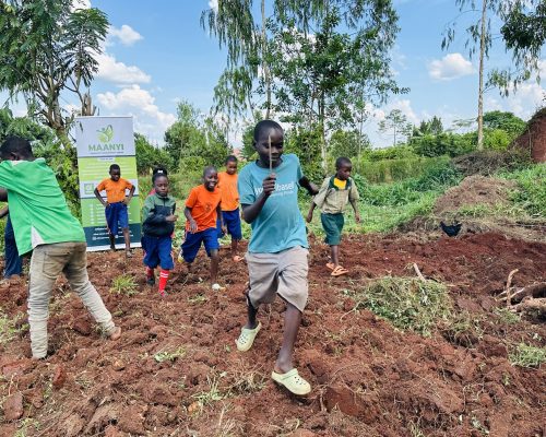 Maanyi Foundation team members working in the field